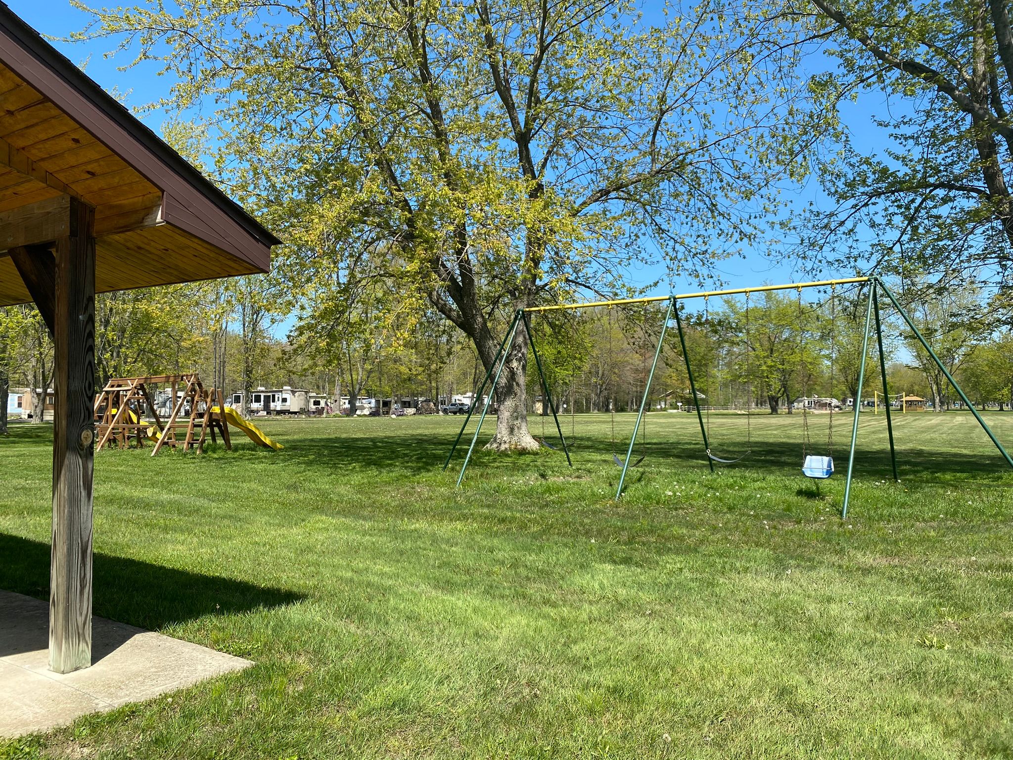 large playground with slides and swing set at willow lake campground