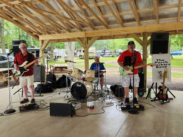 the porch rockers band performing under a pavilion