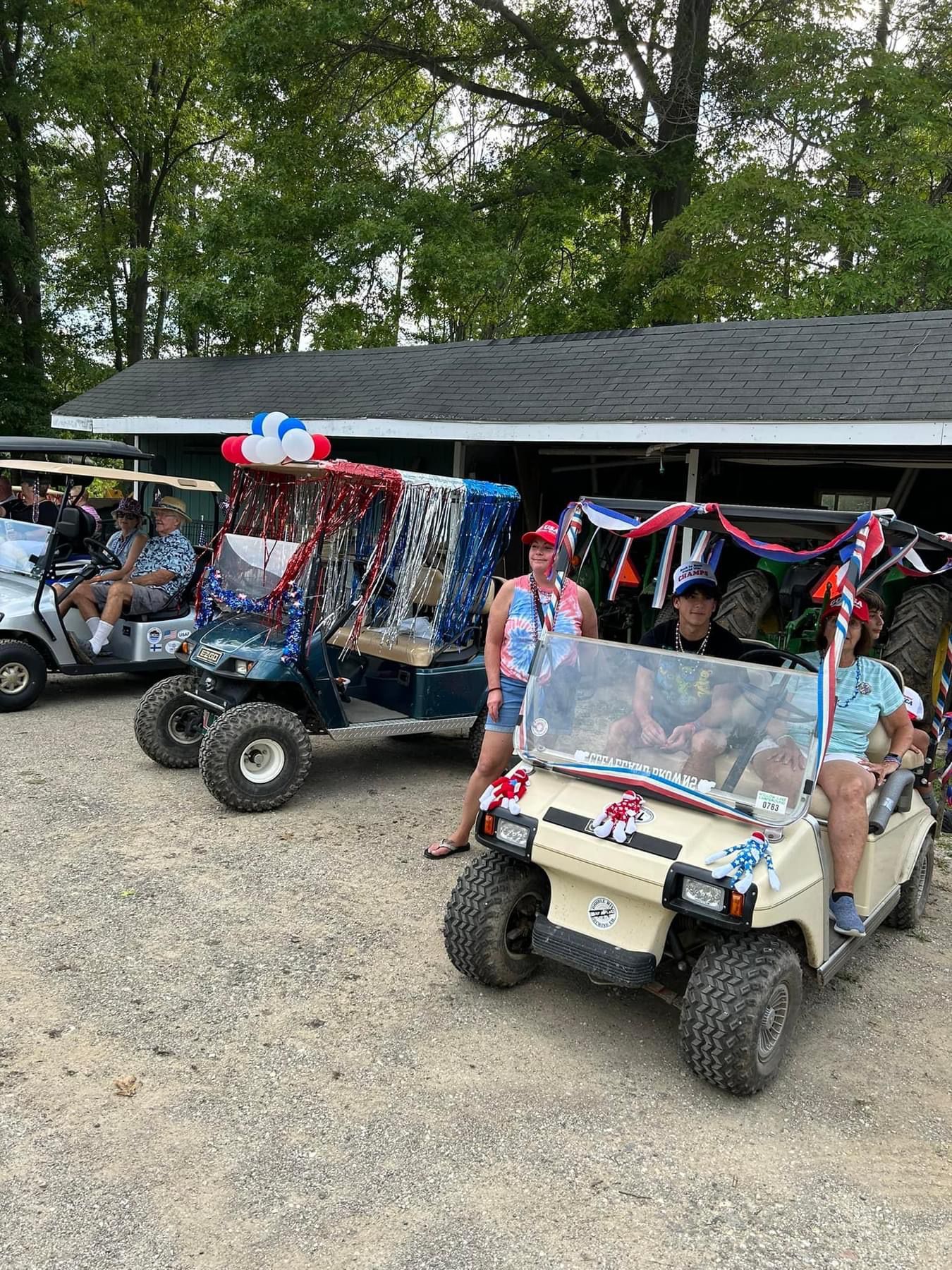 golf carts decorated for the golf cart parade