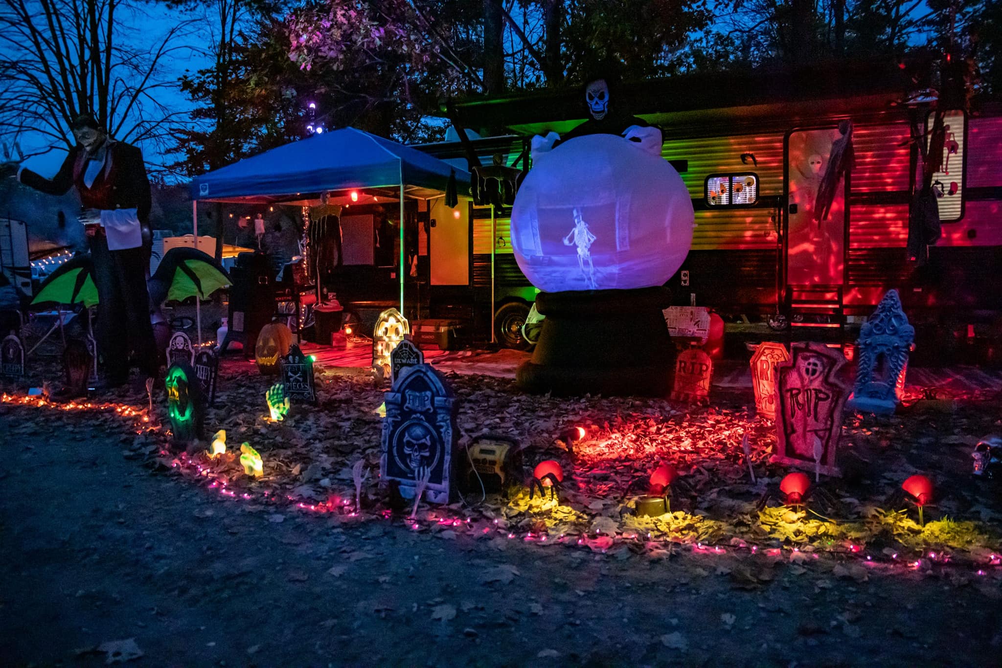 campers decorated for halloween and the trick or treating and pavilion games